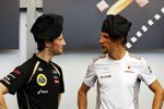 Romain Grosjean (Lotus) und Jenson Button (McLaren) 