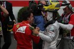 Fernando Alonso (Ferrari) und Nico Rosberg (Mercedes) 