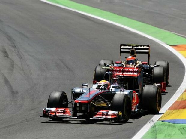 Romain Grosjean, Lewis Hamilton Romain Grosjean, Lewis Hamilton