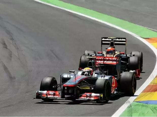 Titel-Bild zur News: Romain Grosjean, Lewis Hamilton