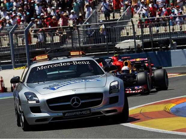 Titel-Bild zur News: Sebastian Vettel hinter dem Safety-Car