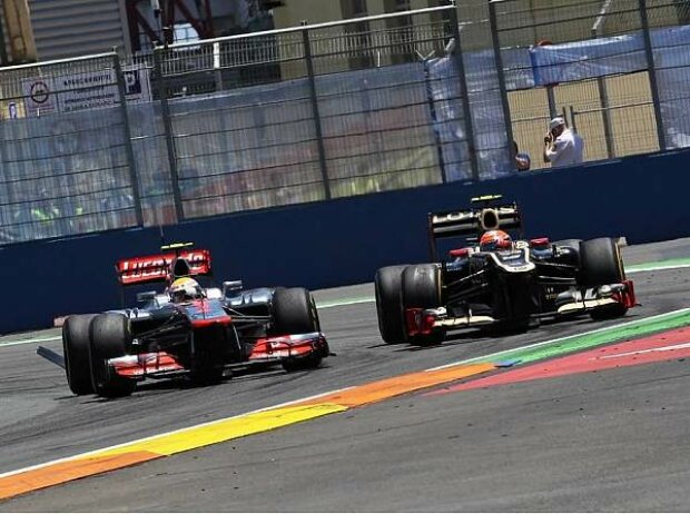 Titel-Bild zur News: Lewis Hamilton und Romain Grosjean