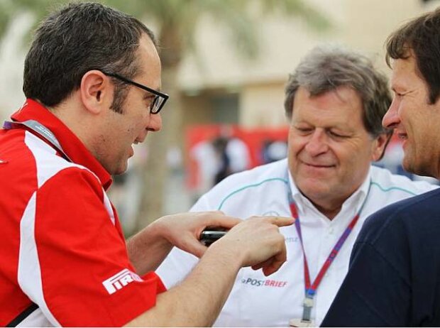 Titel-Bild zur News: Stefano Domenicali (Ferrari-Teamchef), Norbert Haug (Mercedes-Motorsportchef)