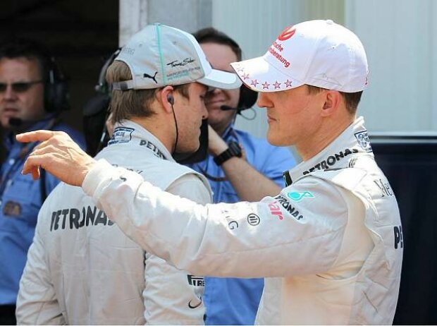 Titel-Bild zur News: Nico Rosberg und Michael Schumacher