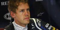 Bild zum Inhalt: Vettel: "Schade für die Leute, die im Regen sitzen"