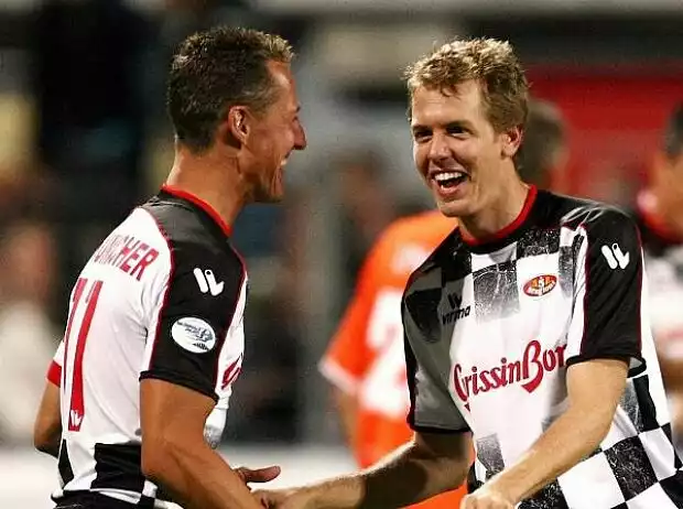 Michael Schumacher, Sebastian Vettel Titel-Bild zur News: Michael Schumacher, Sebastian Vettel