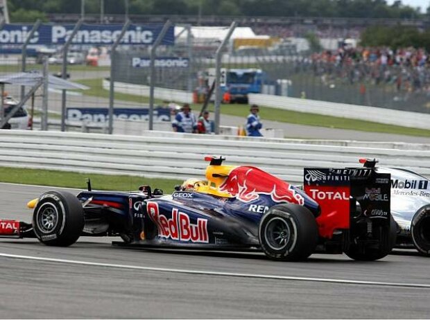 Sebastian Vettel, Jenson Button Sebastian Vettel, Jenson Button