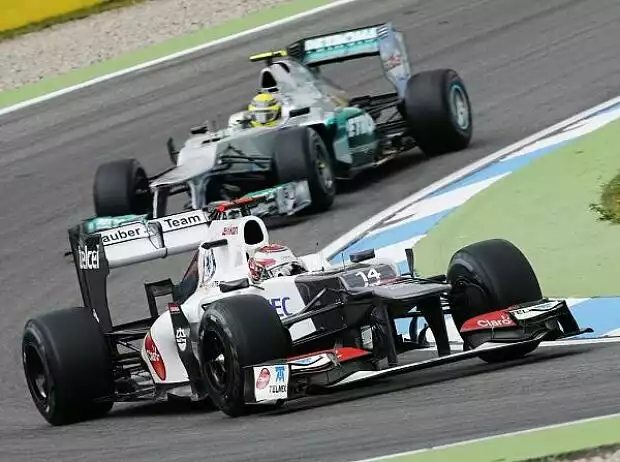 Titel-Bild zur News: Kamui Kobayashi, Nico Rosberg