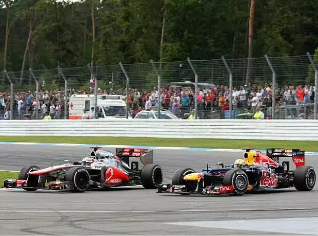 Titel-Bild zur News: Sebastian Vettel, Jenson Button