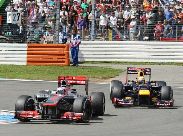 Jenson Button, Sebastian Vettel Jenson Button, Sebastian Vettel
