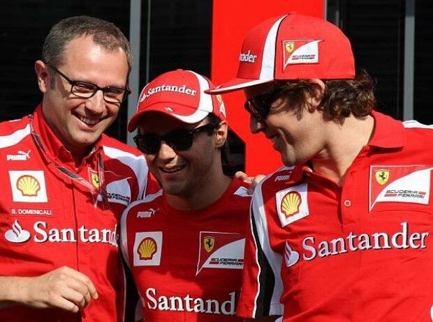 Titel-Bild zur News: Felipe Massa, Stefano Domenicali (Ferrari-Teamchef), Fernando Alonso