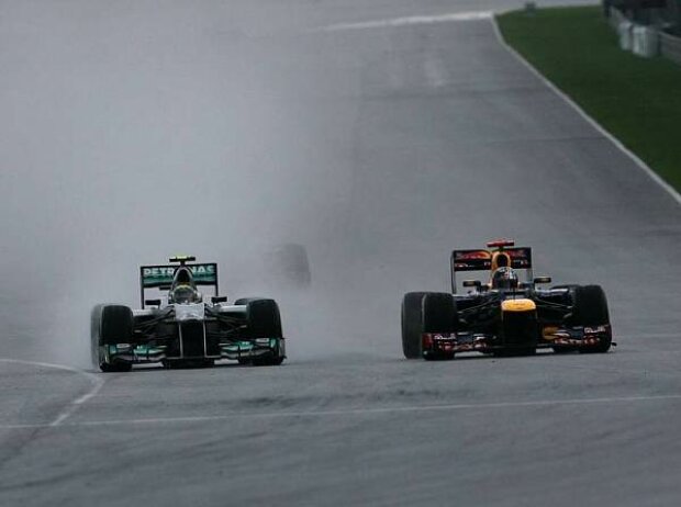 Nico Rosberg, Sebastian Vettel Nico Rosberg, Sebastian Vettel