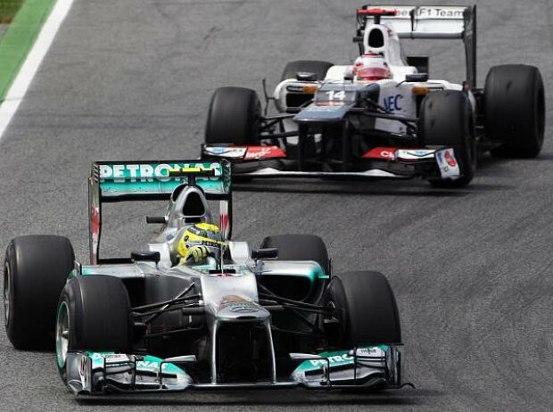 Titel-Bild zur News: Nico Rosberg, Kamui Kobayashi