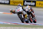 Mika Kallio vor Alex de Angelis 