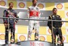 Button und Vettel jubeln, Räikkönen enttäuscht