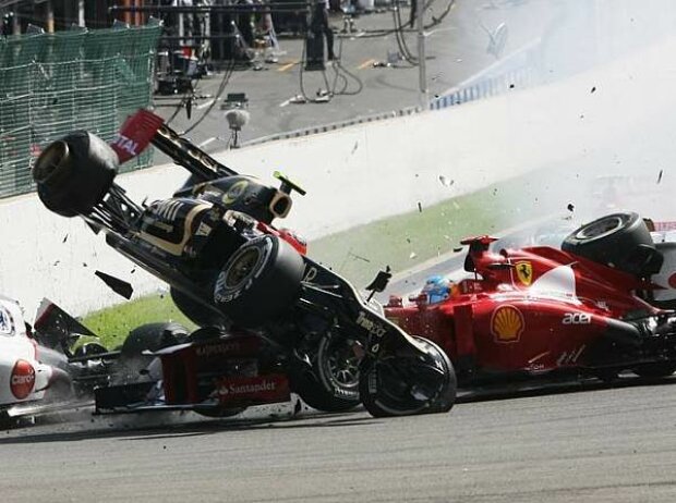 Titel-Bild zur News: Fernando Alonso und Romain Grosjean