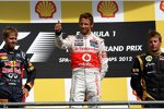 Das Podest in Spa-Francorchamps: Sebastian Vettel (Red Bull), Jenson Button (McLaren) und Kimi Räikkönen (Lotus) 