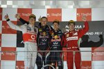 Sebastian Vettel (Red Bull), Jenson Button (McLaren) und Fernando Alonso (Ferrari) 
