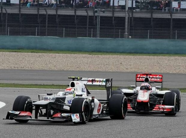 Jenson Button, Sergio Perez Jenson Button, Sergio Perez