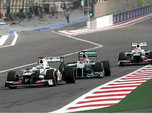 Michael Schumacher, Kamui Kobayashi Titel-Bild zur News: Michael Schumacher, Kamui Kobayashi
