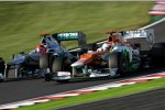 Michael Schumacher (Mercedes) und Paul di Resta (Force India) 