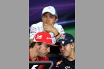 Fernando Alonso (Ferrari) und Sebastian Vettel (Red Bull). Im Hintergrund: Nico Rosberg (Mercedes).