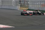 Kimi Räikkönen (Lotus) und Lewis Hamilton (McLaren) 