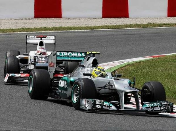 Titel-Bild zur News: Nico Rosberg, Kamui Kobayashi