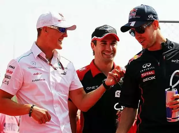 Michael Schumacher, Timo Glock, Sebastian Vettel Titel-Bild zur News: Michael Schumacher, Timo Glock, Sebastian Vettel