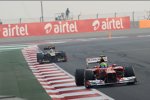 Felipe Massa (Ferrari) vor und Kimi Räikkönen (Lotus) 