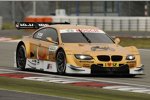 Alessandro Zanardi am Steuer des goldlackierten BMW M3 DTM auf dem Nürburgring