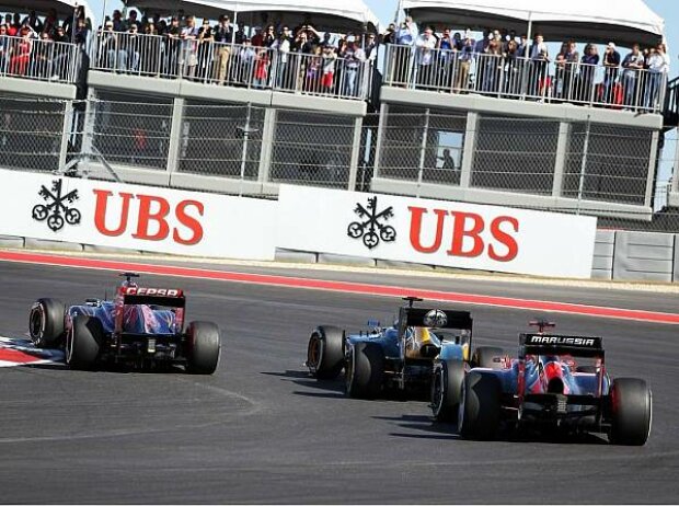 Titel-Bild zur News: Daniel Ricciardo, Witali Petrow, Timo Glock