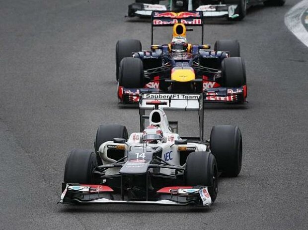 Titel-Bild zur News: Sebastian Vettel, Kamui Kobayashi