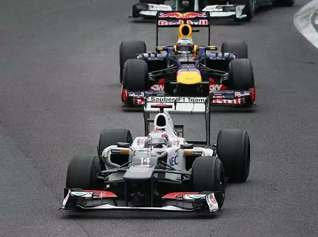 Sebastian Vettel, Kamui Kobayashi Titel-Bild zur News: Sebastian Vettel, Kamui Kobayashi