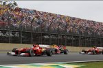 Fernando Alonso (Ferrari), Mark Webber (Red Bull) und Felipe Massa (Ferrari) 