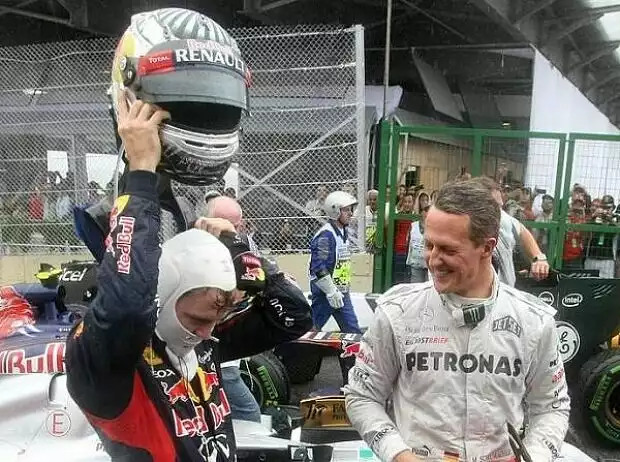 Titel-Bild zur News: Sebastian Vettel und Michael Schumacher