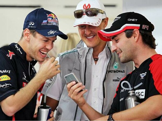 Sebastian Vettel, Michael Schumacher, Timo Glock Sebastian Vettel, Michael Schumacher, Timo Glock