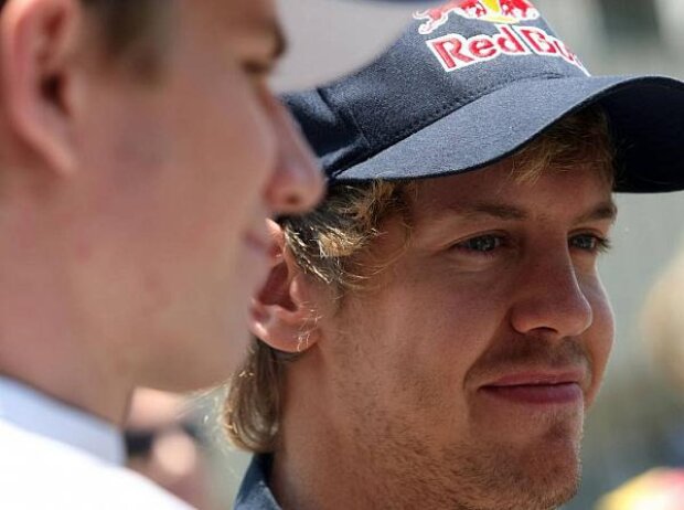 Titel-Bild zur News: Sebastian Vettel, Nico HÃ¼lkenberg