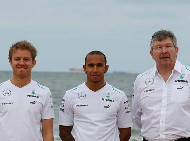 Titel-Bild zur News: Ross Brawn, Lewis Hamilton, Nico Rosberg
