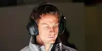 Bild zum Inhalt: Button sieht Schwarz: "Glücklich, unter den Top 10 zu sein"