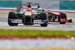 Adrian Sutil (Force India) und Sergio Perez (McLaren) 