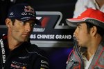 Mark Webber (Red Bull) und Sergio Perez (McLaren) 