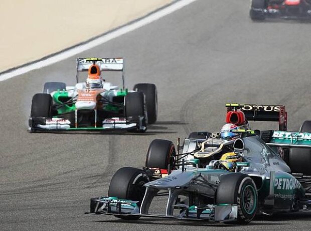 Titel-Bild zur News: Lewis Hamilton, Adrian Sutil