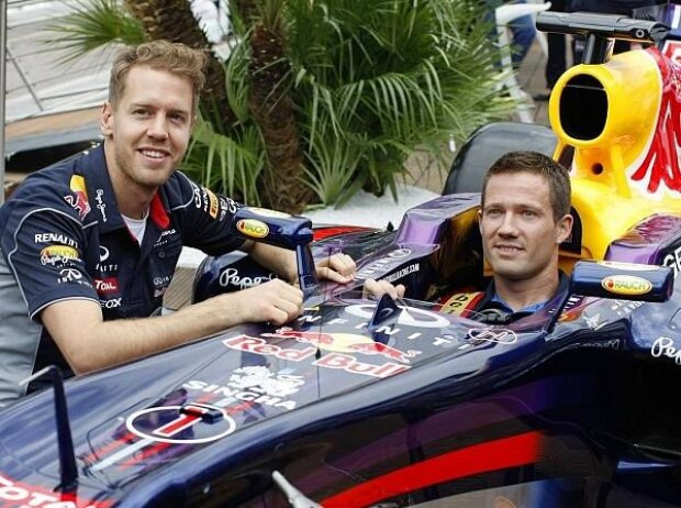 Titel-Bild zur News: Sebastian Vettel, Sebastien Ogier