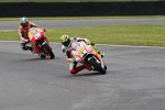 Andrea Iannone vor Daniel Pedrosa 