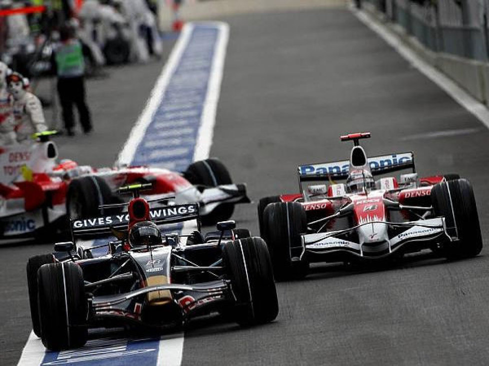 Jarno Trulli, Sebastian Vettel