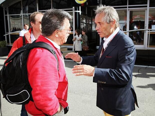 Rainer W. Schlegelmilch und Jacky Ickx