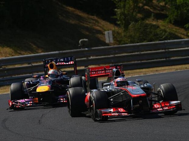 Jenson Button, Sebastian Vettel Jenson Button, Sebastian Vettel