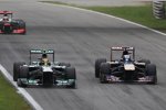 Lewis Hamilton (Mercedes) und Jean-Eric Vergne (Toro Rosso) 