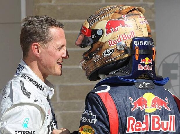 Michael Schumacher, Sebastian Vettel Michael Schumacher, Sebastian Vettel